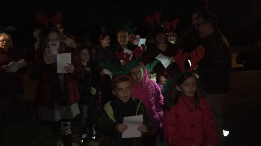 old fashioned christmas tree stockings caroling
